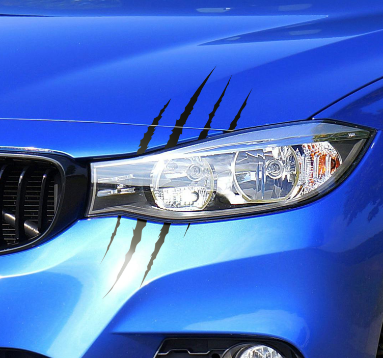 Ajovaloissa naarmuja autotarra - Tenstickers