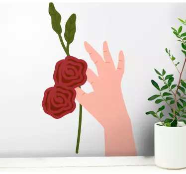 Käsi pitelee ruusuja luontoaiheinen seinätarra - Tenstickers